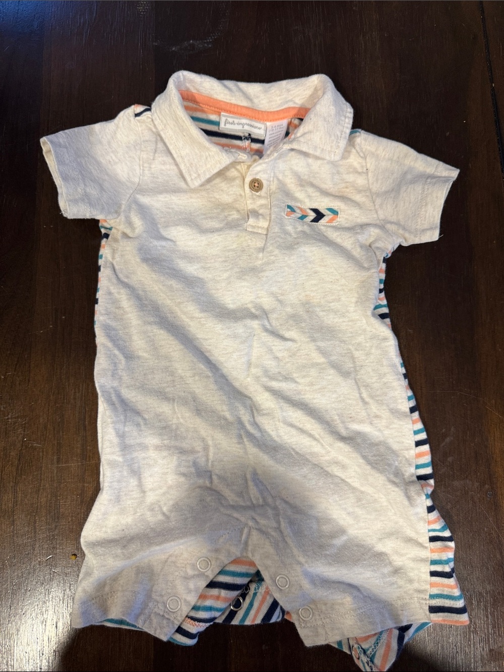 First Impressions Cream Polo Romper with Blue and Orange Stripes